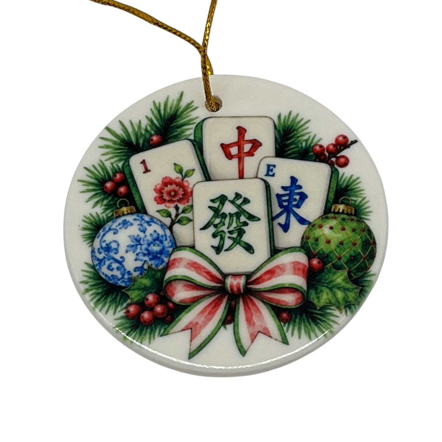 Holiday Mahjong Hand 3 inch porcelain Christmas ornament with festive mahjong tiles, evergreen branches, red berries, ornaments and striped holiday bow