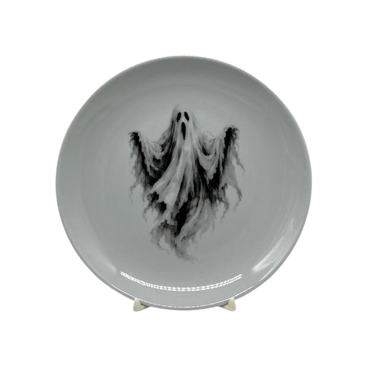 Haunted Spirit 6.25 inch Halloween coupe plate with flowing black-and-white ghost artwork